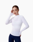 Women's Equestrian long sleeve and mock neck training top in crisp white
